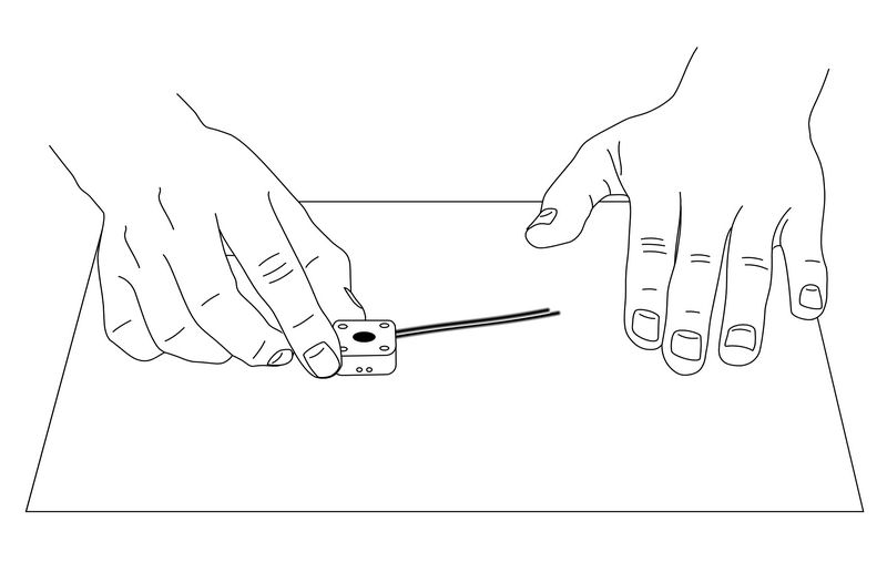 Fig. 6-9 Remove excess carbon paste on flat paper.