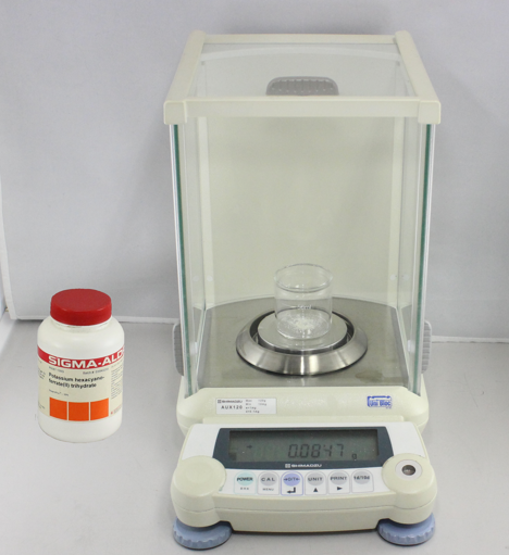 Fig. 5-2 Weigh the potassium ferrocyanide (1) using directly the beaker 50 mL (2) with an analytical digital balance.
